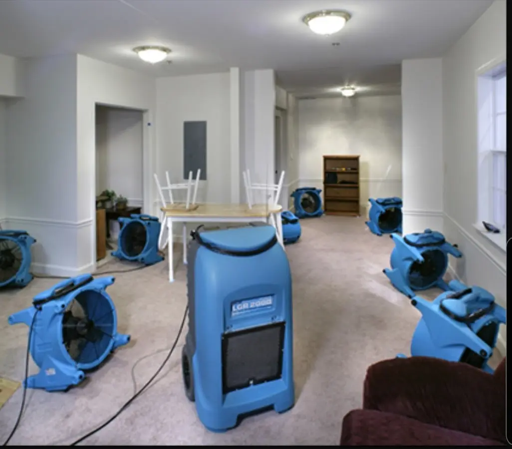 Air movers and dehumidifier setup for Water Damage Restoration in Brownfields